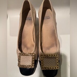 Stuart Weitzman Beige Perforated Flats with Black Cap Toe and Gold Chain Buckle